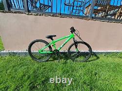 Bmx dirt jumper green and black good condition medium sized bike for ages 12- 15