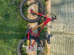Specialized bike red, yellow. Good condition. Few scratches around the bike