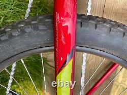 Specialized bike red, yellow. Good condition. Few scratches around the bike